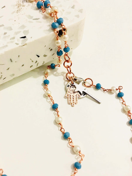 Rosary pearls and blu stones long necklace with magic wand and hamsa charms. - Maiden-Art
