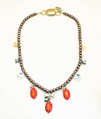 Beaded necklace with orange rhinestones, silver plated brass and small charms. - Maiden-Art