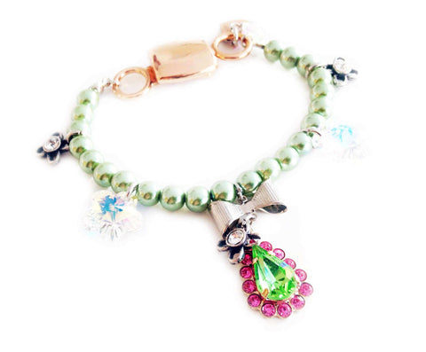 Light green beaded bracelet with pink and green rhinestones. - Maiden-Art