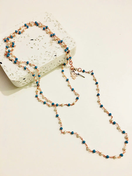 Rosary pearls and blu stones long necklace with magic wand and hamsa charms. - Maiden-Art