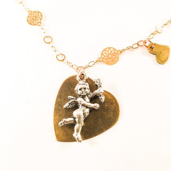 Silver Cherub And Bronze Heart Charm Necklace with 18kt Gold Plated Flower Chain and 3 small hearts charms. - Maiden-Art